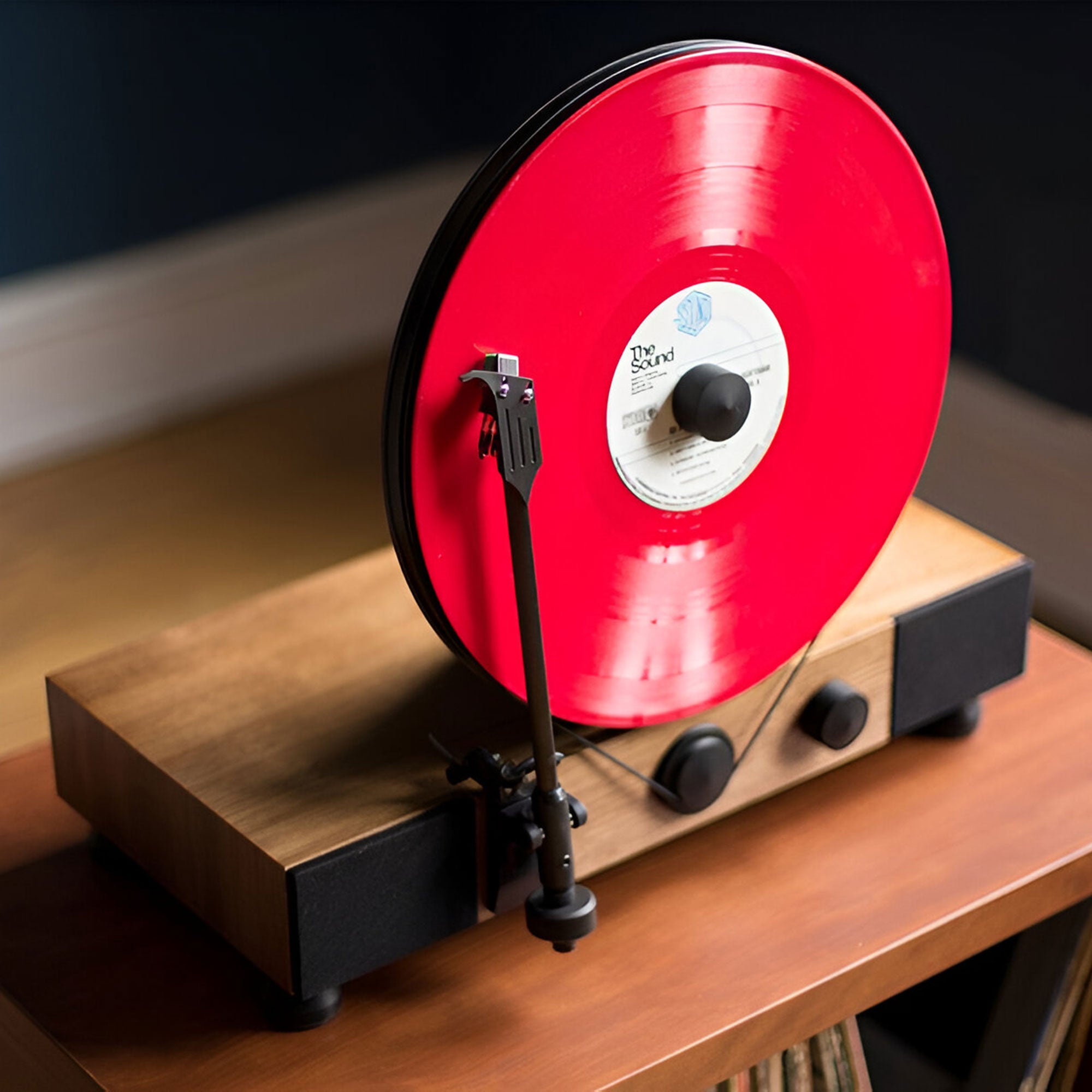 Floating Record vertical Bluetooth turntable with built-in stereo speakers.